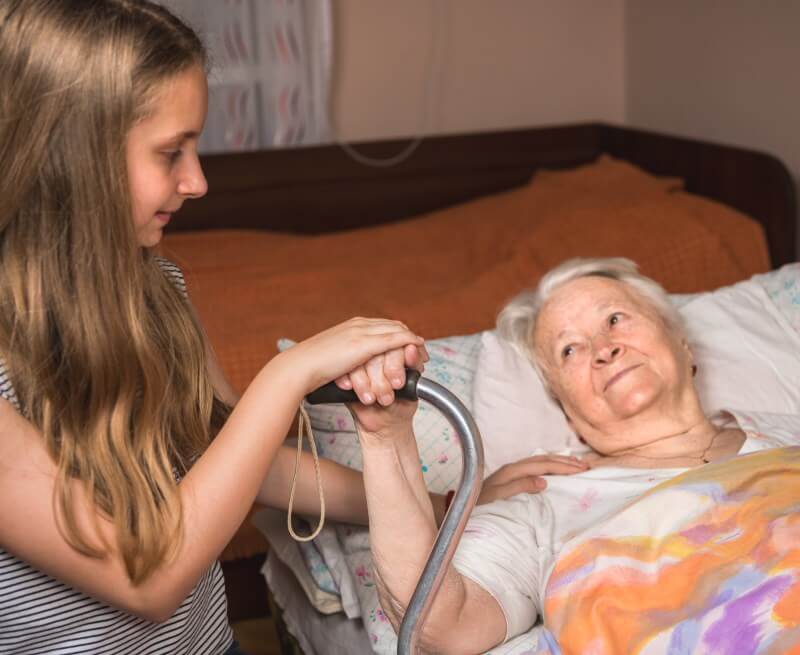 Grundpflege: Alte Dame im Bett